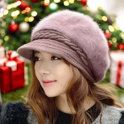 Woman wearing a winter rabbit fur knitted beret hat