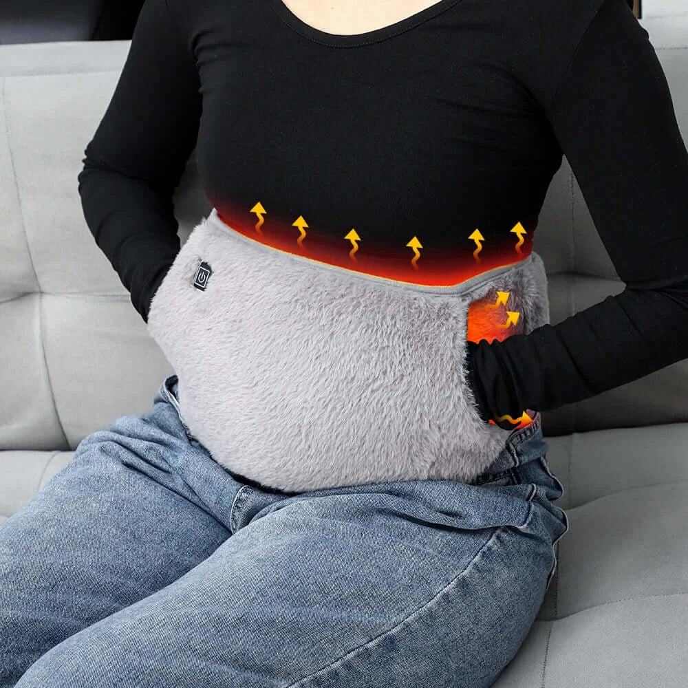 Woman using graphene heating pad for warmth