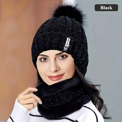 a woman wearing a cozy winter knit hat and scarf set in a snowy outdoor setting Softsnuggle